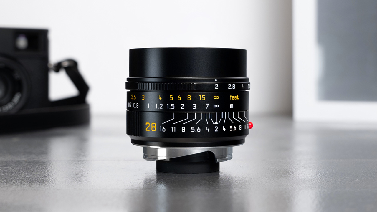 The next-gen Summicron-M 28mm f/2 ASPH. Lens offers closer focusing, down to 15.7"; an integrated, extendable lens hood; and a lighter, more streamlined exterior.