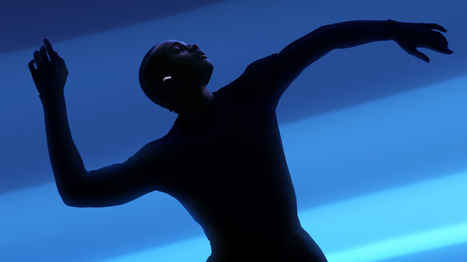 Male silhouette wearing Apple Airpods 5