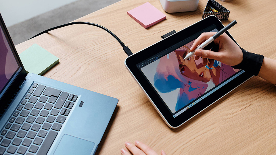 Person with Wacom One 12 Illustrating