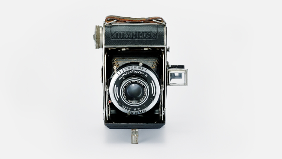Semi Olympus-I Camera with a ZUIKO Lens Semi Olympus-I Camera with a ZUIKO Lens