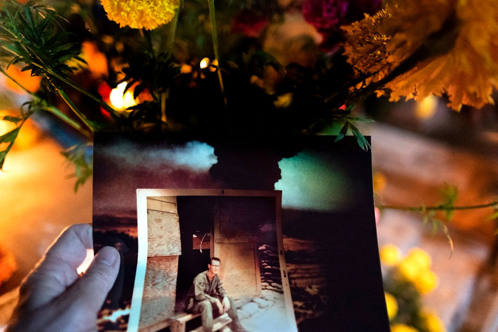 In the book’s final chapter, archival photographs mix with elements from a candlelit floral display to symbolize “the healing of bad memories in order to bring about their transformation to another, more positive, form.” These images are further enhanced by Leica Q’s rich color palette.&nbsp;